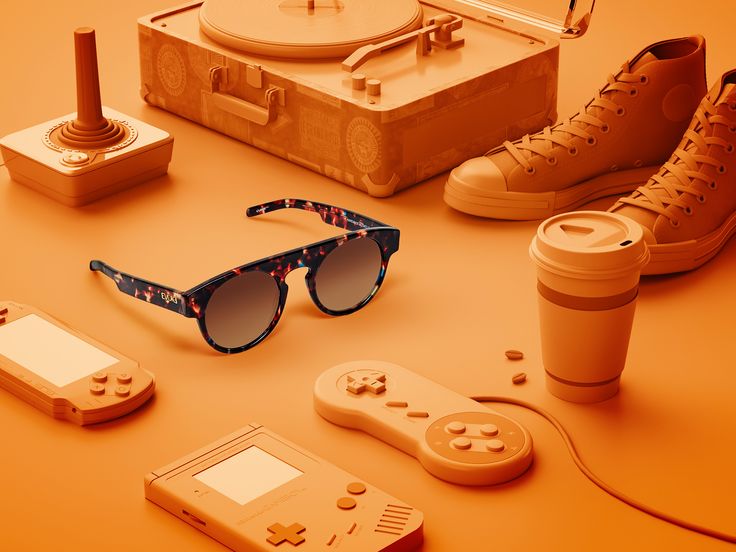 an assortment of items that include sunglasses, coffee cup, and video game remotes