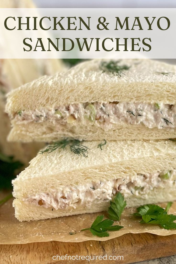 Triangle shaped chicken sandwiches on white bread sitting on a wooden board scattered with parsley and dill. Chicken Sandwich Filling, Party Sandwiches Recipes, Chicken Mayonnaise, Chicken Mayo Sandwich, Tea Party Sandwiches Recipes, Mayonnaise Sandwich, Awesome Chicken, Mayo Sandwich, Chicken Salad Sandwich Recipe