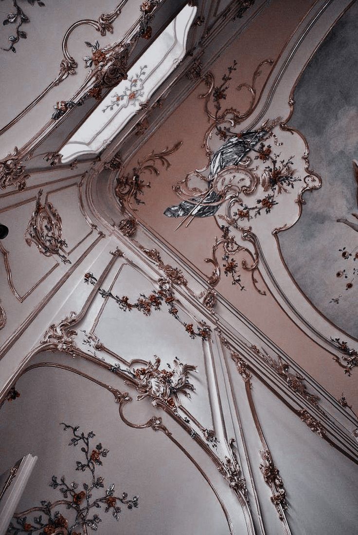 an ornately decorated ceiling in a building