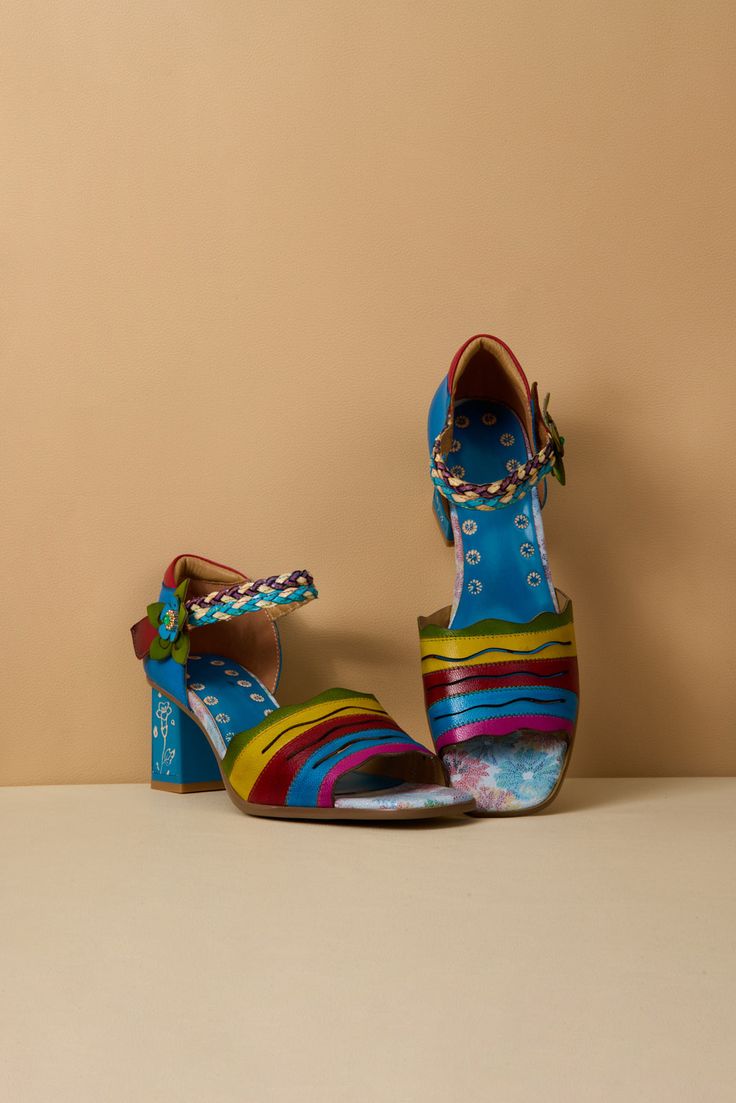 Take a bold step into adventure with our Soffia rainbow pump heels, featuring a vibrant rainbow stripe leather upper pattern. Elevate your style and make a statement with these daring and romantic heels. Show off your fearless attitude and rock these shades of striped pumps with confidence and romance! 2.56" heel Snap clasp closure Genuine leather upper Leather footbed Leather lining Leather midsole Rubber sole Multicolor Leather Heels With Ankle Strap, Multicolor Ankle Strap Leather Heels, Multicolor Leather Ankle Strap Heels, Spring Rainbow Open Toe Heels, Multicolor 4-inch Heel Closed Toe Heels, Multicolor Closed Toe Heels With 4-inch Heel, Retro Multicolor High Heels, Vibrant Colorful High Heels, Multicolor Wooden Heel Spring Heels