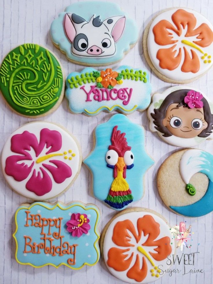 some decorated cookies are on a table