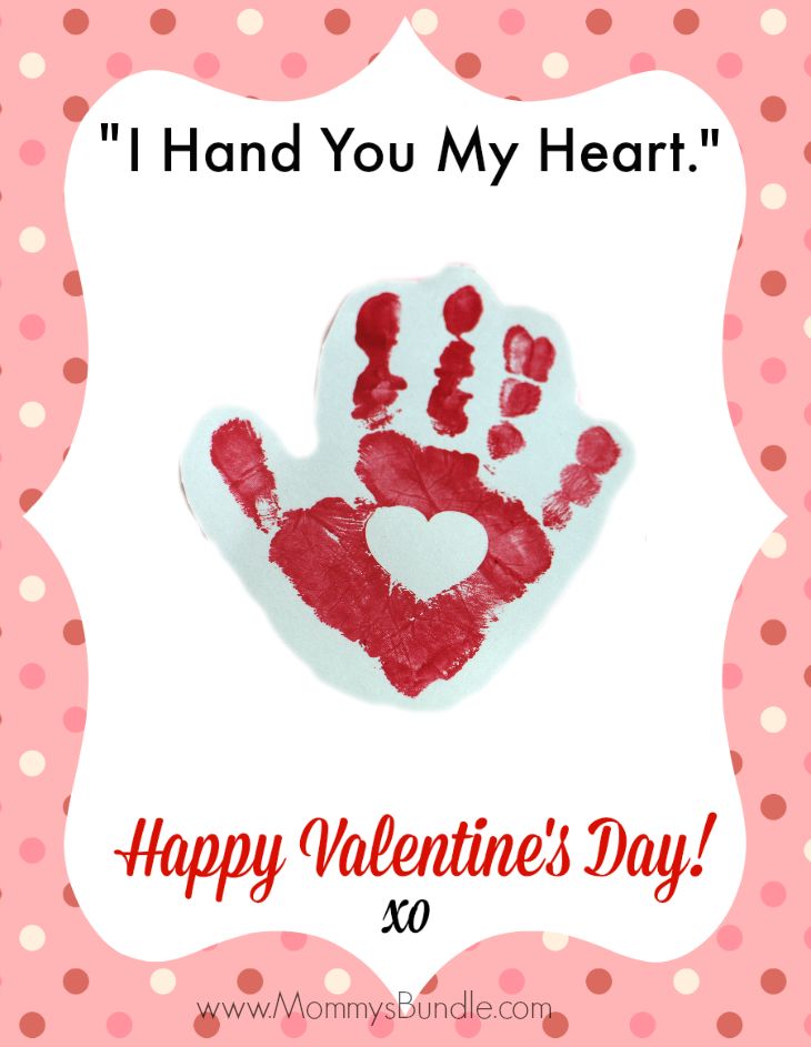 valentine's day card with handprinted heart on pink polka dot background and text that reads, i hand you my heart happy valentine's day xo