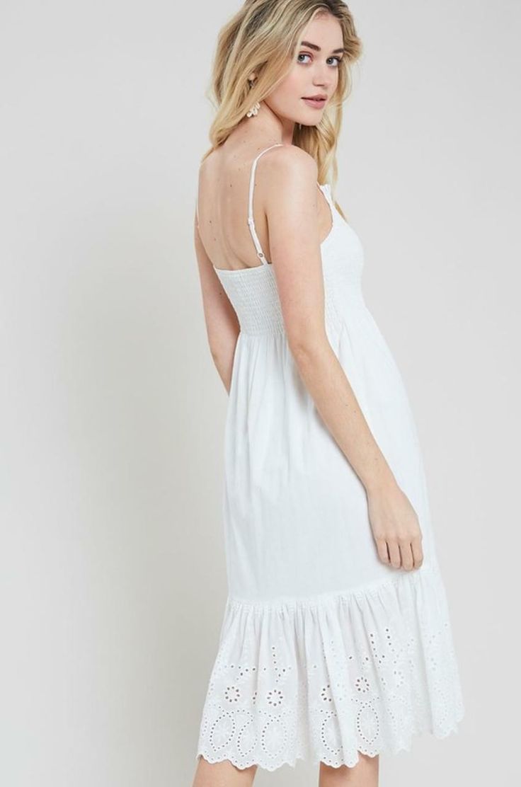 From beach days to a village stroll, all eyes will be on you in the adorable Summer Sun White Smocked Midi Dress! Adjustable tank straps top this sweet midi made from ivory white lightweight woven fabric. A square neckline and stretchy smocked bodice top a flowy midi skirt with an eyelet lace ruffle hem. DETAILS & CARE Cotton. Dry Clean. Imported. ORDERS, SHIPPING & RETURNS Orders, Shipping, & Returns Summer Smocked Cotton Dress With Adjustable Straps, White Smocked Summer Dress For Vacation, White Smocked Dress For Vacation, White Summer Smocked Dress For Vacation, White Summer Smocked Dress For Beach, Cotton Smocked Dress With Tie Straps For Vacation, White Smocked Dress For The Beach, White Smocked Dress For Beach, White Smocked Dress For Summer Vacation