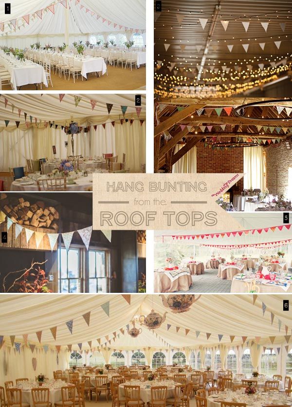 the inside of a building with many tables and chairs, decorated in white linens