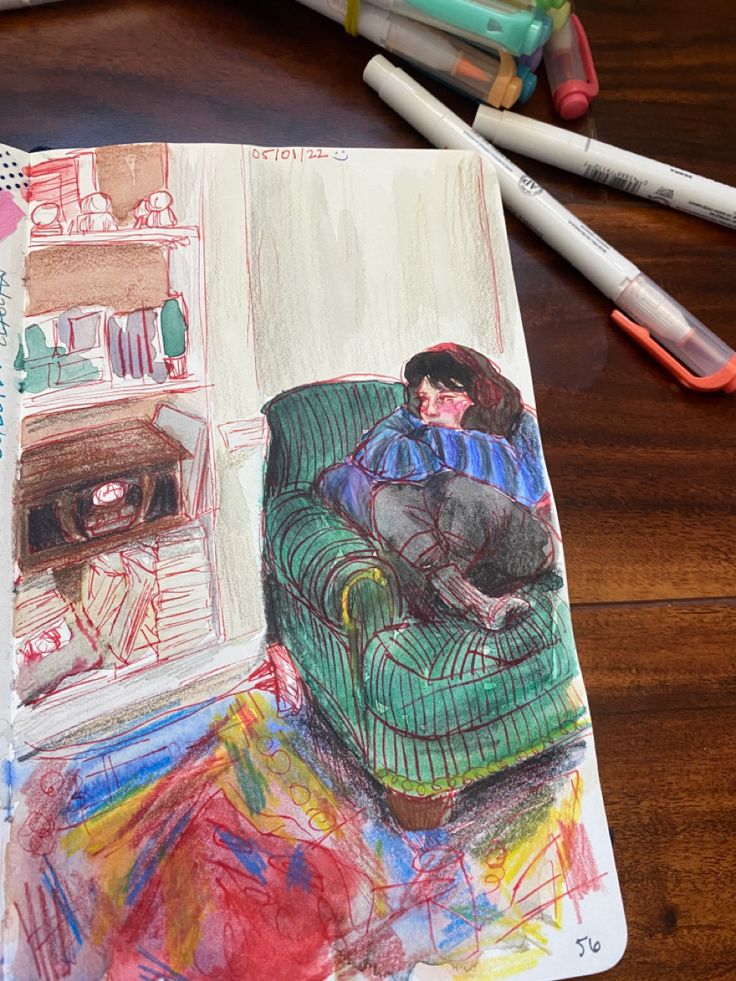 a drawing of a woman sitting on a green couch next to colored crayons