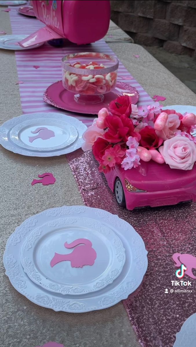 Party planner event planner Barbie themed birthday Party Barbie Centerpiece barbie car Pink themed party Barbie Birthday Party Centerpiece, Barbie Car Centerpieces Ideas, Barbie Table Set Up, Barbie Theme Party Centerpieces, Barbie Themed Centerpieces, Barbie Picnic Party, Barbie Car Centerpiece, Barbie Themed Birthday Party Decor Table Settings, Barbie Birthday Party Centerpieces