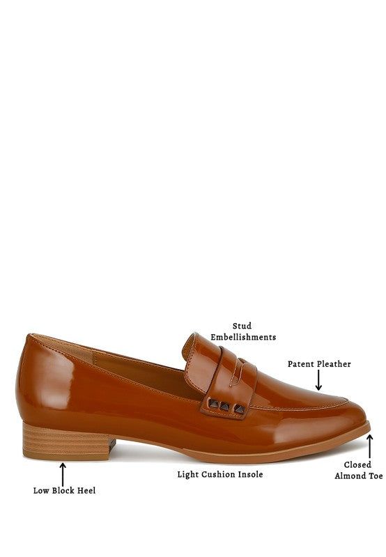 Crafted in patent genuine leather, these loafers feature a timeless almond toe. The penny strap with subtle stud detailing adds drama and class. The low-block heeled loafers can be paired with formal wear or dresses for a polished yet summery look.Type : LoafersUpper Material: Patent PleatherOuter Sole: RubberClosed Almond ToePenny Strap DetailStud EmbellishmentsLow Block HeelHeel Height: 2.5cm/0.98 inchesRCSH4842 Style: Formal Embellishment: Stud Closure: Slip-on Heel Height: 0.98 inches Made I Spring Patent Leather Work Loafers, Flat Patent Leather Loafers For Work, Business Casual Patent Leather Loafers With Almond Toe, Brown Patent Leather Oxfords For Work, Medium Width Low Heel Oxfords For Work, Workwear Oxfords With Medium Width And Low Heel, Office Patent Leather Loafers With Almond Toe, Office Patent Leather Loafers Medium Width, Patent Leather Brogue Loafers For Business Casual