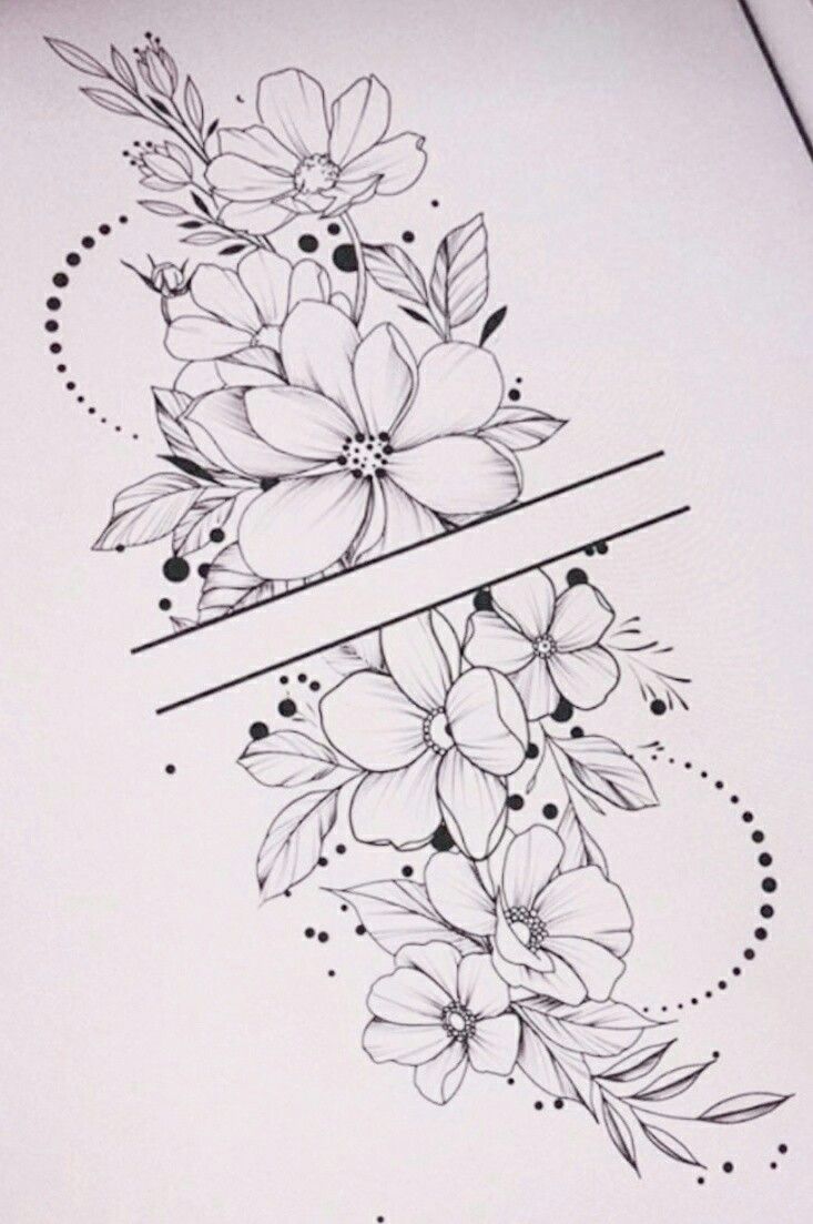 an open book with flowers on it and two lines in the middle that are black and white