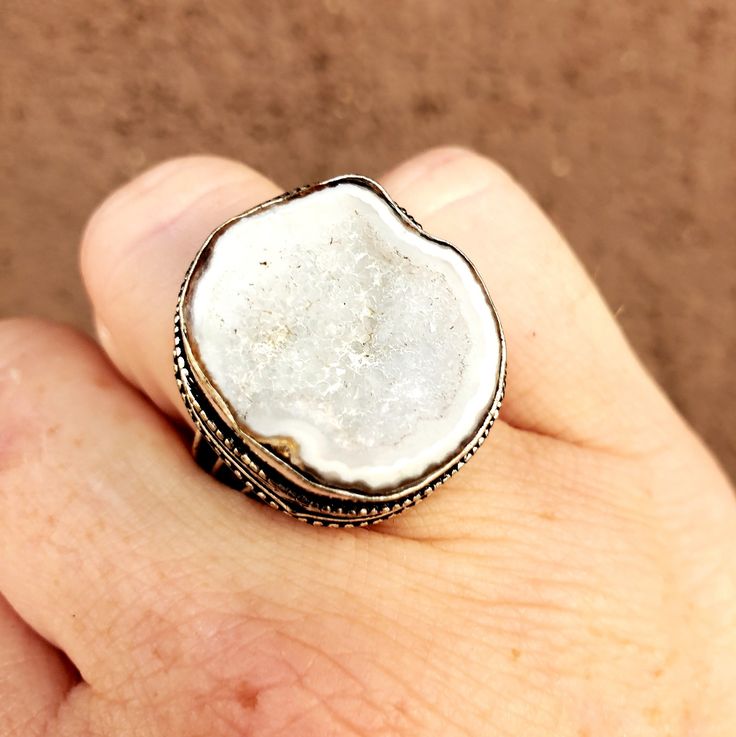 Brand New Handmade Solar Agate Druzy Antique Design Silver Ring. Size 8 925 Stamped New To Poshmark? Use Referral Code Kimberlyn222 To Receive $10. Adjustable White Crystal Ring Gift, Adjustable White Crystal Ring For Gifts, Adjustable Artisan White Jewelry, Adjustable White Artisan Jewelry, Artisan White Jewelry Stamped 925, Unique White Round Jewelry, Round Agate Jewelry With Stone Setting, Adjustable White Gemstone Jewelry, Unique Round Gemstone Geodes