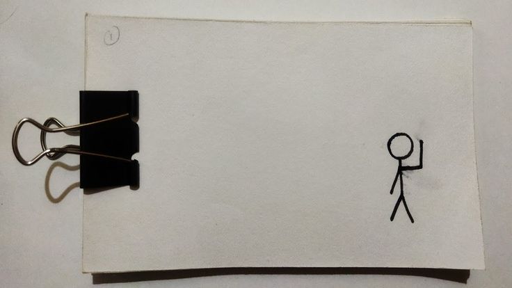 a piece of paper with a stick figure drawn on it