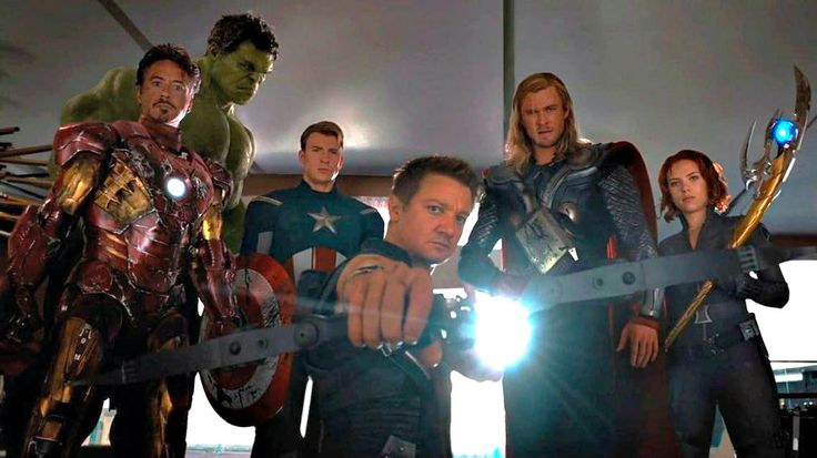 the avengers team is posing for a photo