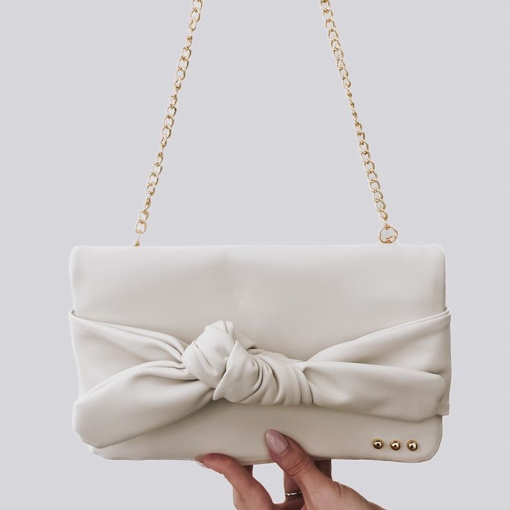 Billie Bow Clutch Crossbody Bag Wholesale-Clutch-Pretty Simple Everyday Bow Satchel Bag, Everyday Satchel Bag With Bow, Chic Shoulder Bag With Detachable Bow, Chic Everyday Bags With Bow Detail, Chic Shoulder Bag With Bow, Chic Everyday Bags With Bow, Elegant Beige Bag With Bow, Chic Crossbody Shoulder Bag With Bow, Elegant Pouch Bag For Day Out