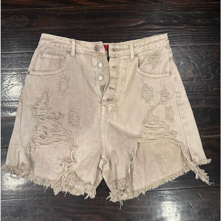 Size Medium. Brand New With Tags Distressed High Waist Jean Shorts For Spring, High Waist Distressed Jean Shorts For Spring, Trendy Distressed Short Bottoms, Casual Distressed High-waisted Jean Shorts, Distressed Short Cotton Jeans, Distressed Cotton Short Jeans, Distressed Short Jeans For Spring, Beige High-waisted Jean Shorts Casual, Beige Denim Bottoms For Spring