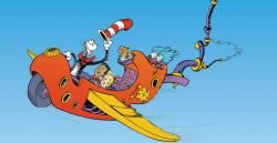 the cat in the hat is riding on a plane with other animals and cats around it