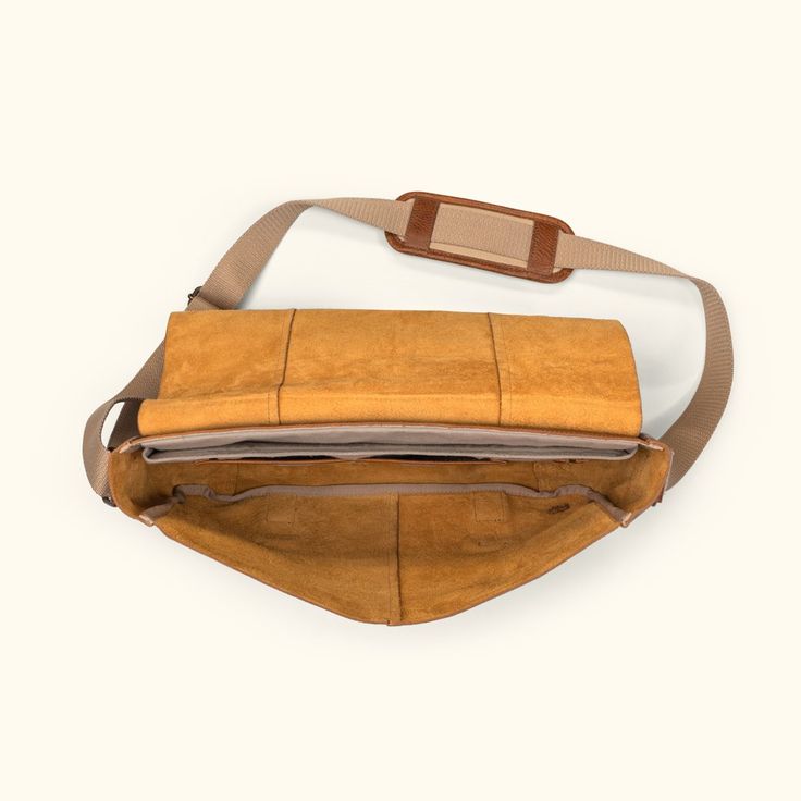 rustic leather messenger bag for laptops and commuters Luxury Flap Shoulder Bag For Travel, Classic Rectangular Coated Canvas Briefcase, Luxury Coated Canvas Saddle Bag For Everyday Use, Luxury Everyday Saddle Bag In Coated Canvas, Luxury Everyday Coated Canvas Saddle Bag, Luxury Coated Canvas Flap Bag For Everyday, Luxury Coated Canvas Flap Bag For Travel, Luxury Flap Bag For Travel, Rectangular Coated Canvas Flap Bag