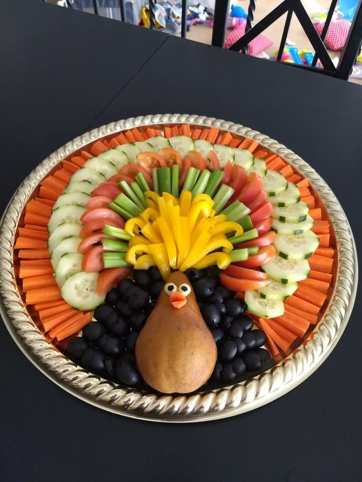 a turkey made out of fruits and vegetables