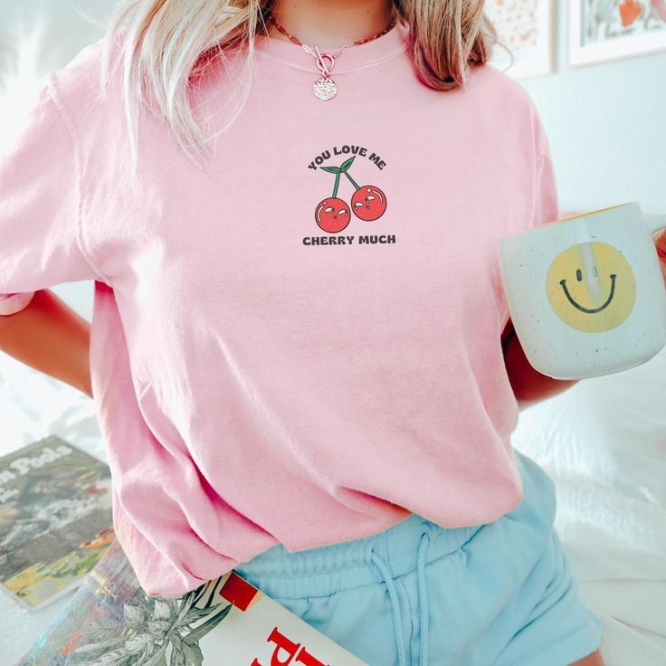 🩴 Cherries Shirt.  You Love Me Berry Much! 🩴 Click here to view our shop for more great designs --- https://www.etsy.com/shop/GraceAndFlipFlops Click on the ❤️ to see our new designs as they arrive. 🩴 Comfort Colors T-Shirt - The unisex cotton tee is the perfect staple of any wardrobe. The Unisex relaxed fit makes it an excellent daily choice. 🩴 Sizing - See listing image for a specific sizing chart for this style. Please note these are unisex style, and therefore have a more relaxed fit. If Cute Pink T-shirt With Text Print, Cute Pink Slogan Tops, Kawaii Cotton T-shirt With Letter Print, Kawaii Crew Neck Top With Letter Print, Kawaii Crew Neck Shirt With Letter Print, Kawaii Relaxed Fit Top With Graphic Print, Kawaii Graphic Print Tops With Relaxed Fit, Kawaii Crew Neck Top With Screen Print, Kawaii Graphic Print Top With Relaxed Fit