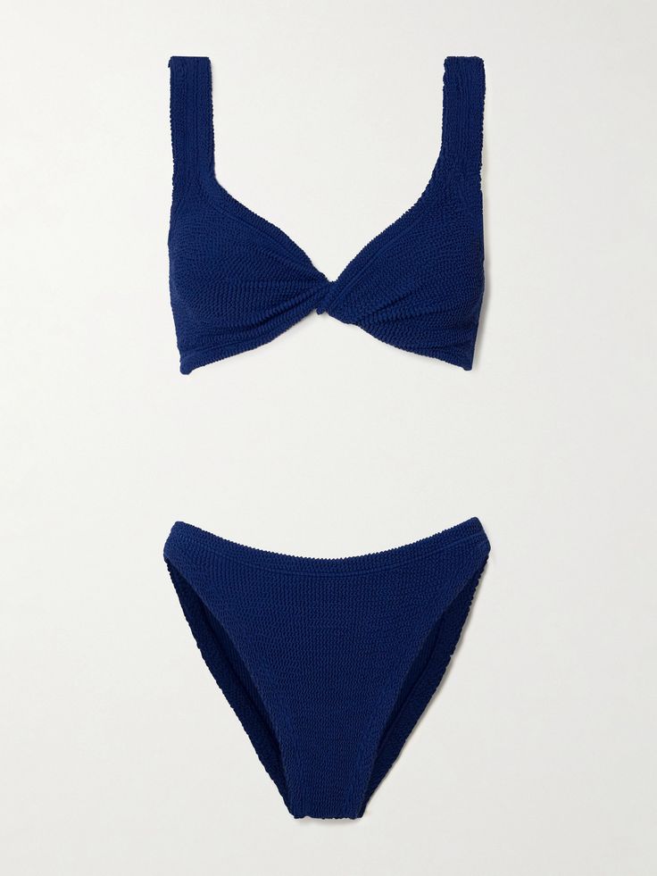 Hunza G's 'Juno' bikini is cut from the brand's signature seersucker, which was made globally famous by Julia Roberts in Pretty Woman. Locally made and dyed in the UK, it has a twist-front top and classic briefs. Textured Beachwear Swimwear For Beach Season, Textured Beachwear Swimwear For Vacation, Fitted Textured Blue Swimwear, Blue Textured Fitted Swimwear, Textured Blue Beachwear Swimwear, Blue Textured Beachwear Swimwear, Textured Blue Swimwear For Summer, Textured Blue Swimwear For Pool, Blue Textured Swimwear For Pool