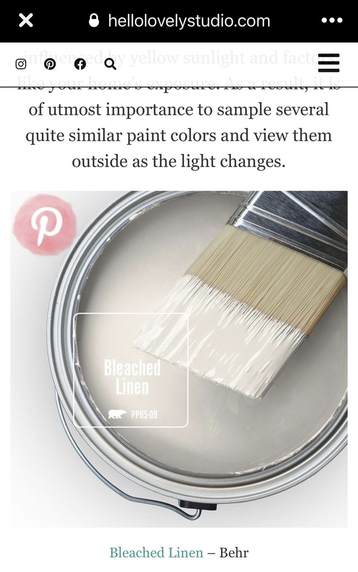 a paint can with a brush in it and the text below reads, behr