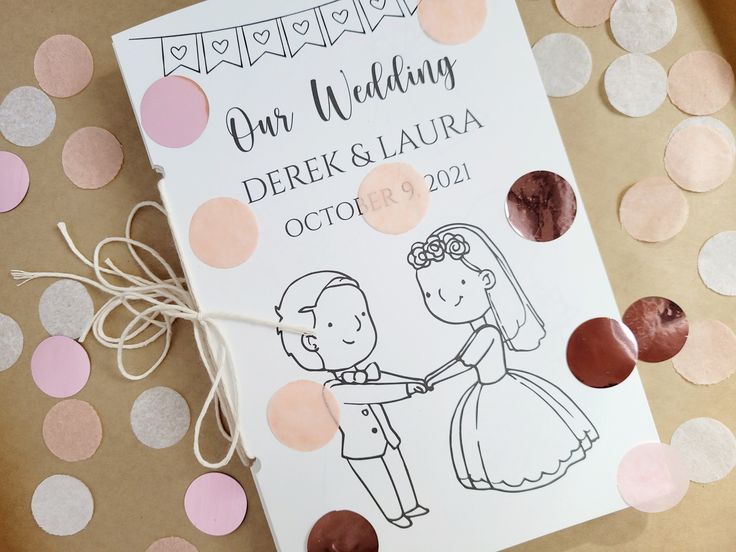 a wedding program with chocolates and confetti on the table next to it