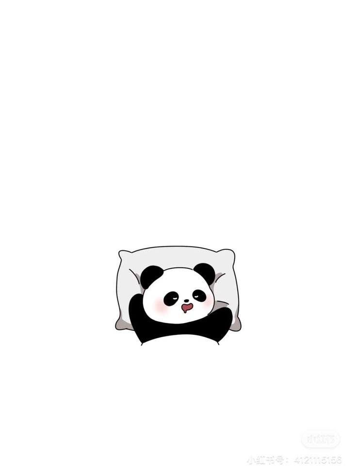 a black and white panda bear laying on top of a pillow