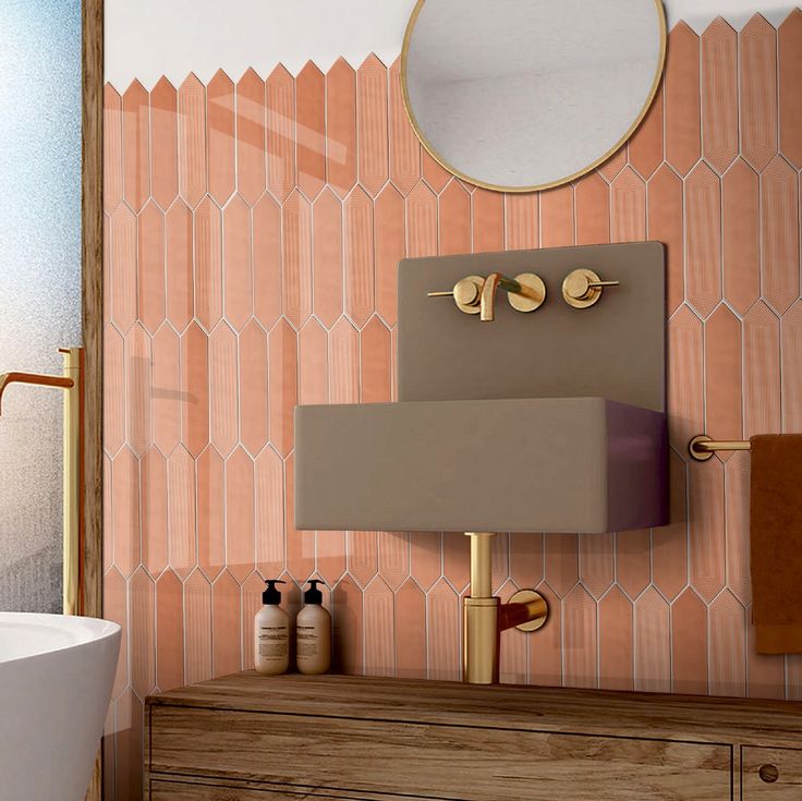 a bathroom with a sink, mirror and bathtub next to a wallpapered wall