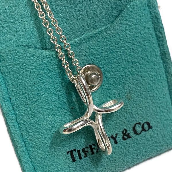 Tiffany & Co Silver Necklace, 16” Long Chain, 925 Stamped And Tiffany, Made In Spain. Infinity Cross 1”X1” .25” Wide. Comes With Pouch That Separates Pendant From Chain. Infinity Cross, Tiffany And Co Necklace, Long Chain, Tiffany & Co., Womens Jewelry Necklace, Silver Necklace, Pouch, Jewelry Necklaces, Women Jewelry