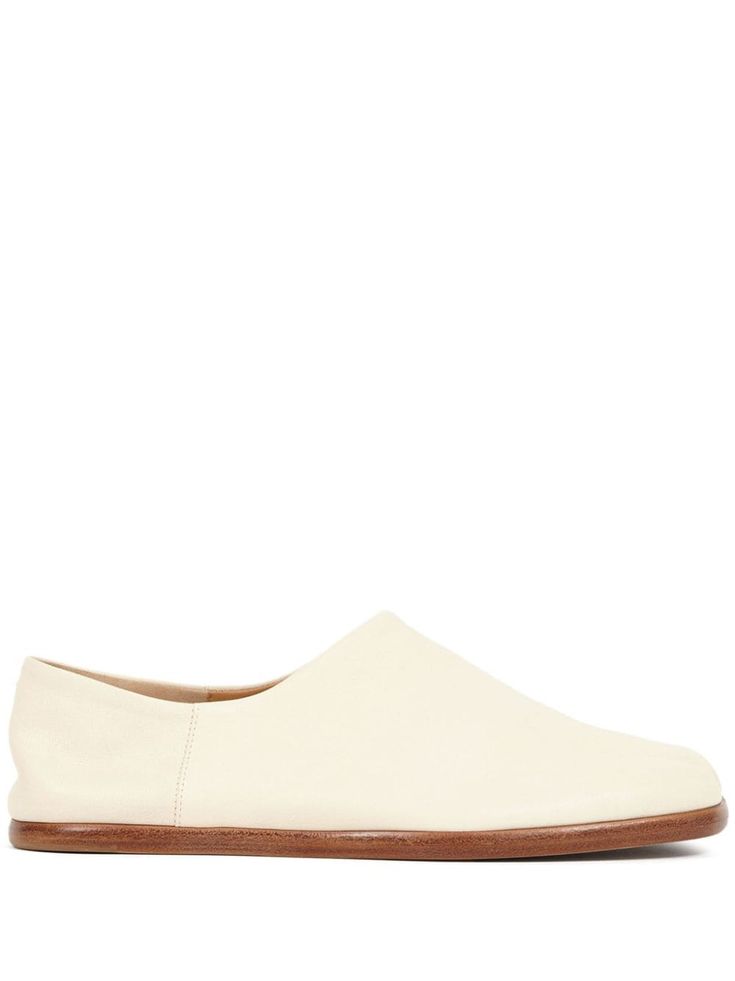 ivory white nappa leather signature single-stitch logo signature Tabi toe slip-on style flat leather sole Classic White Slip-ons With Flat Heel, Beige Flat Slip-ons With Leather Sole, Classic Beige Slip-ons With Flat Heel, White Leather Slip-ons With Leather Footbed, Beige Slip-on Flats With Leather Sole, White Leather Slip-ons With Stitched Sole, Classic White Flat-heel Slip-ons, Cream Leather Flat Slip-ons, Classic White Flat Slip-ons