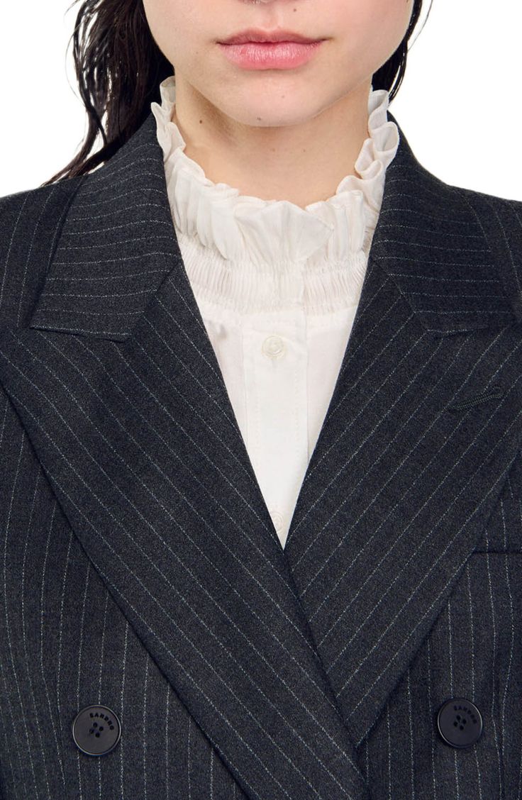 Slim-fit pinstriped suit jacket, featuring a stand-up collar, a double-breasted design with buttons, long sleeves and welt pockets.  This jacket matches the trousers ,  shorts  and  tie Sandro Women's suit jacket Fitted design Pinstriped Double-breasted button fastening Long sleeves SANDRO logo buttons Welt pockets on waist The model is 5'8 tall and wears a size 4 Elegant Pinstripe Outerwear With Button Closure, Pinstripe Outerwear With Suit Collar For Semi-formal, Semi-formal Pinstripe Outerwear With Suit Collar, Chic Pinstripe Suits With Notch Lapel, Pinstripe Notch Lapel Semi-formal Outerwear, Pinstripe Notch Lapel Blazer For Office, Pinstripe Outerwear With Double Button Closure For Office, Pinstripe Blazer With Double Button Closure For Office, Semi-formal Pinstripe Outerwear With Notch Lapel