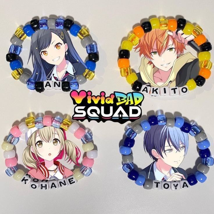 four bracelets with anime characters on them