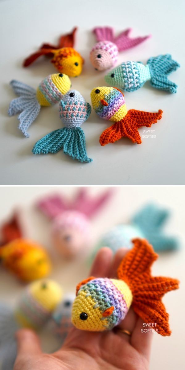 crocheted toy fish made from yarns in different colors and sizes sitting on a table