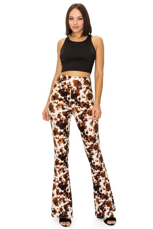 Flair Cow Print Leggings. High waisted pant in a fitted style with flared hem. These Leggings are super soft and perfect to wear with your cowboy boots! 92% Polyester, 8% Spandex Inseam: 32" SIZING: S(2-4) M(6-8) L(10-12) XL(14) Stretch Flares For Fall, Non-stretch Flared Hem Bottoms For Fall, Casual Flares With Flared Hem For Fall, Fitted Brown Flare Jeans, Fitted Flare Jeans With Flared Hem For Summer, Chic Fitted Flare Leggings, Trendy Fitted Flares With Flared Hem, Stretch Flare Bottoms For Fall, Fitted Brown Flare Jeans For Fall