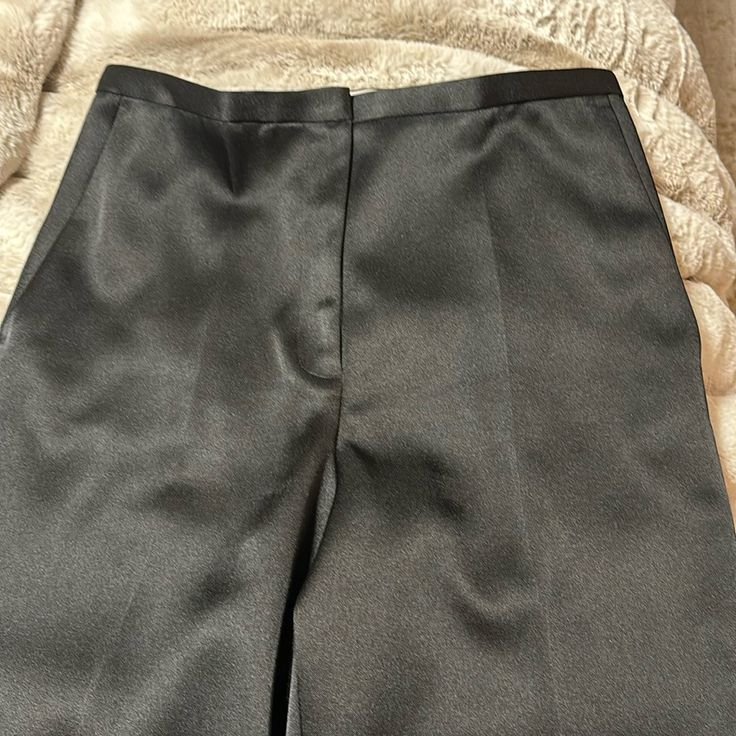 Excellent Condition Black Silk Wide Leg Bottoms, Chic Black Semi-formal Pants, Black Satin Summer Bottoms, Formal Satin Straight Pants, Sleek Satin Bottoms For Workwear, Classic Satin Trousers, Tailored Satin Pants For Workwear, Classic Satin Pants For Workwear, Chic Satin Bottoms For Formal Occasions