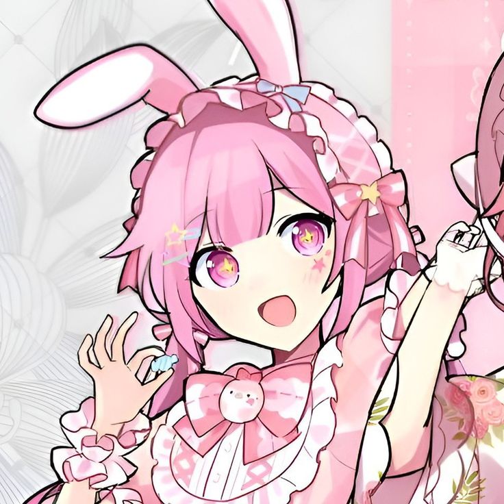 an anime character with pink hair and bunny ears