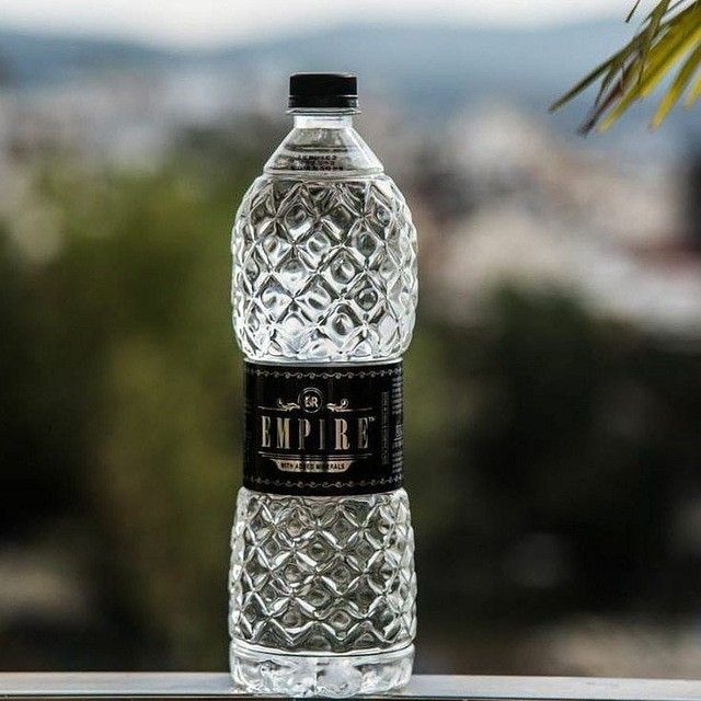 a bottle of water sitting on top of a table