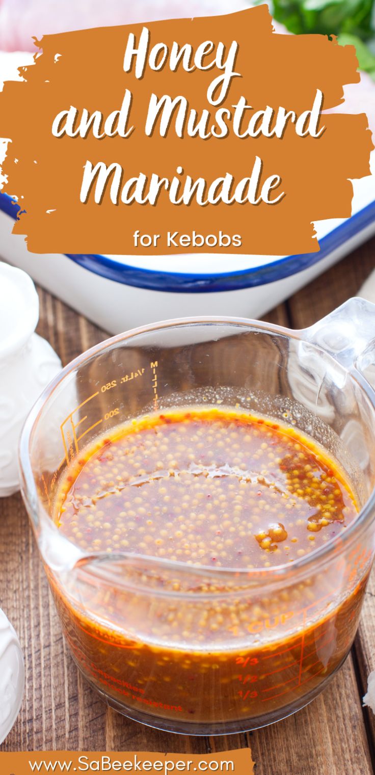 honey and mustard marinade for kebabs in a glass bowl on a wooden table