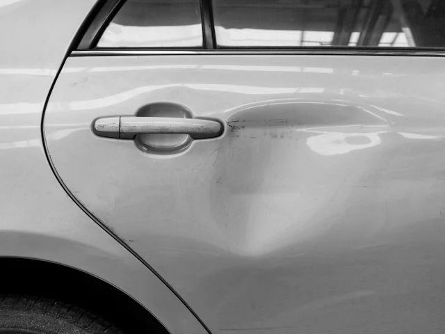 a close up of a door handle on a car