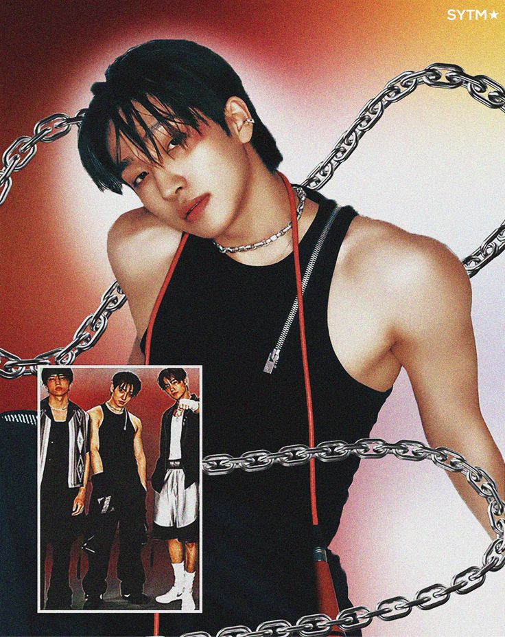 an image of a young man with chains around his neck and wearing a black tank top