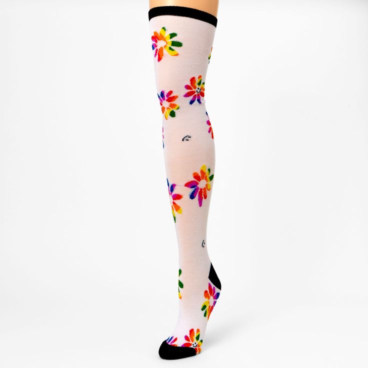 Wear these happy rainbow daisies with pride, for costume parties, parades, and any other time you want to really make a statement! Over-the-knee socks look great with skirts, shorts, and dresses, and they're a fashion essential that never really goes out of style. Pack Size: 1 pair One size Approx. shoe sizes: 12 youth to 7 ladies Material: Nylon - Claire's Rainbow Stripe Mesh Over The Knee Socks Casual Multicolor Stockings, Playful Multicolor Knee-high Socks, Trendy Multicolor Socks For Spring, Knee-high Socks For Spring Stocking Stuffer, Fitted Casual Summer Stockings, Multicolor Thigh High Casual Socks, Fun Multicolor Summer Socks, Pink Fitted Knee-high Socks For Spring, Multicolor Casual Thigh-high Socks