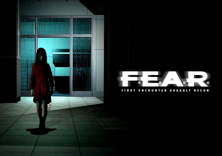 a woman standing in front of a door with the word fear on it's side