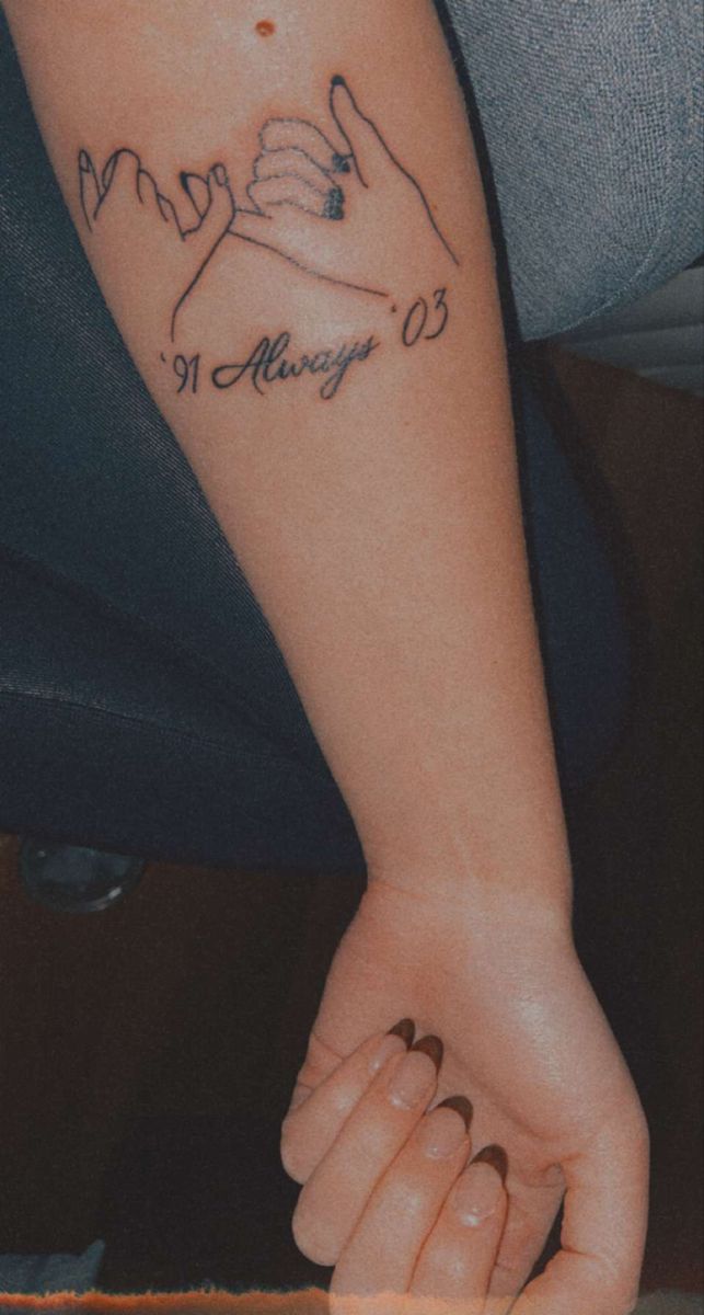 a woman's arm with a tattoo on it that reads, may 19 always