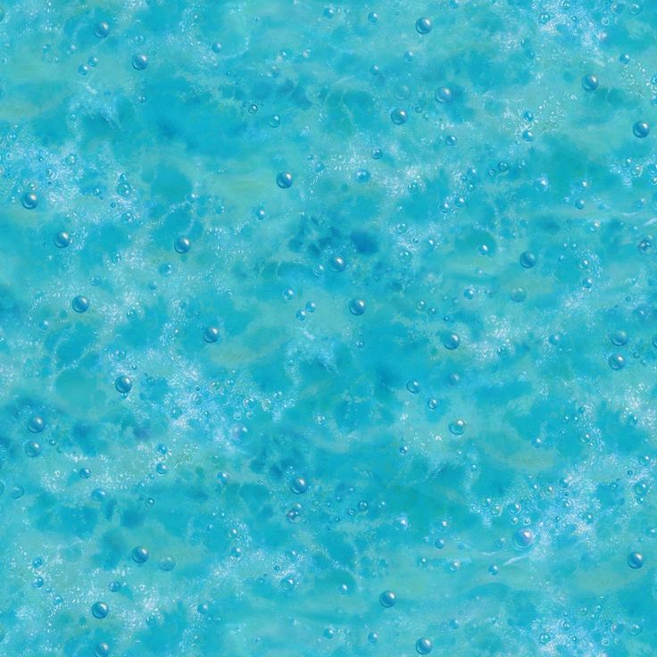 the water is blue and has bubbles on it