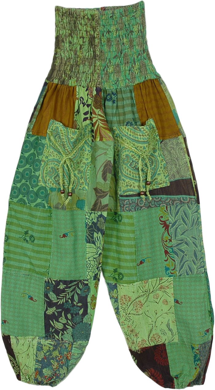 These harem pants have an overall loose fit, they are comfortable yet snug because of the smocked waist area.  The pants have beautiful ornate patterns in shades of green so they look bohemian and feel extremely comfortable. #tlb #SplitSkirtsPants #Patchwork #Pocket #vacationclothing #bohemianfashion #Patchworkharemcottonpants #greenharempants Green Patchwork Pants For Spring, Green Patchwork Bottoms For Summer, Summer Green Patchwork Bottoms, Green Baggy Harem Pants, Green Cotton Harem Pants With Elastic Waistband, Summer Green Harem Pants With Elastic Waistband, Casual Green Boho Print Bottoms, Green Baggy Pants For Festival, Baggy Green Pants For Festival