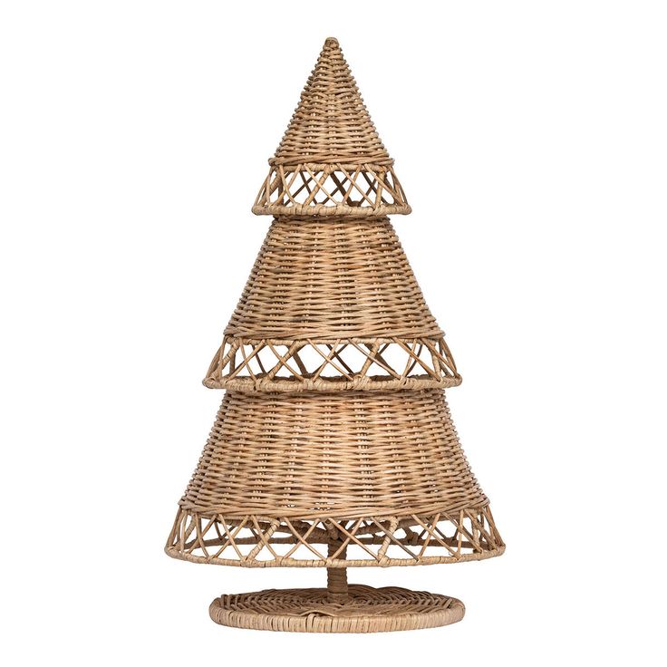 a wicker christmas tree is shown on a white background, with the base made out of