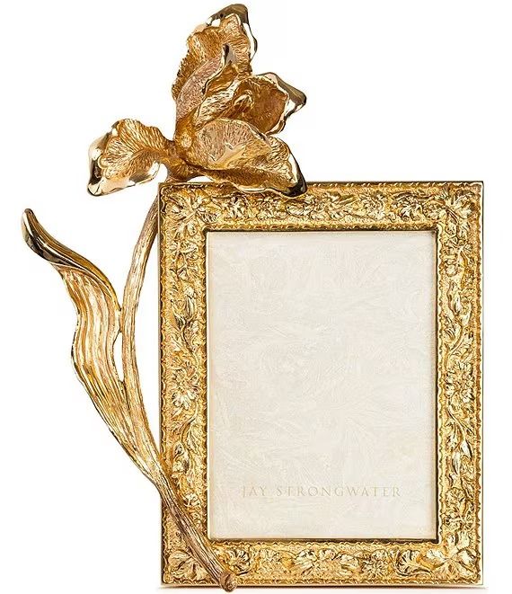 an ornate gold frame with a flower on the top and bottom, in front of a white background