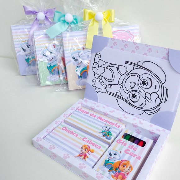 an open box containing stationery items for children's drawings and coloring books,