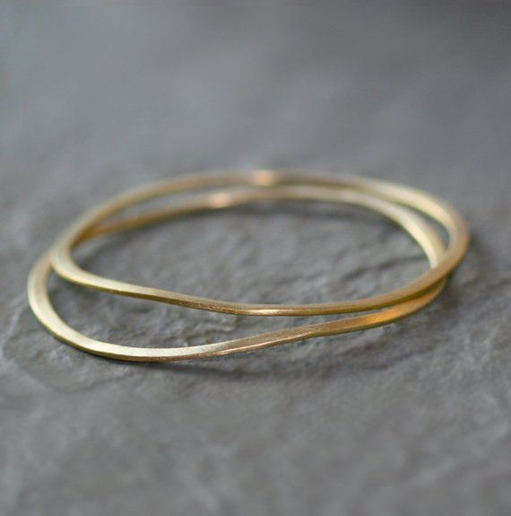 Please read my shop announcement for delivery time. If you need it by a specific date, please contact me first. Thank you!Gift packaging as well as a gift note is available at checkout. If you want to include a note, add your message in the note box during checkout.The price is for ONE bangle only.  Flat wavy bangle in brass, approx. 1/8" wide. The bangle has an organic feel and look great stacked. Also offered in sterling silver in a separate listing. Approx. interior diameter is 2.4".If you ha Layer Bracelets, The Bangles, Brass Bangle, Me First, Crescent Moon Necklace, Note Box, Jewelry Inspo, Gold Bangles, Gift Packaging