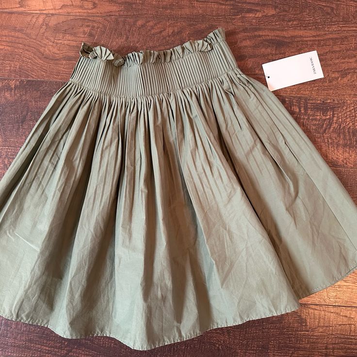 Zara Skirt Brand New Size Small Zara Stretch Skirt For Day Out, Zara Skirt For Day Out, Chic Solid Color Skirt For Spring, Spring Lined Solid Mini Skirt, Casual Voluminous Pleated Skirt For Summer, Zara Stretch Skirt For Summer, Spring Solid Color Pleated Skirt With Elastic Waistband, Solid Pleated Skirt With Elastic Waistband For Spring, Zara Stretch Summer Skirt