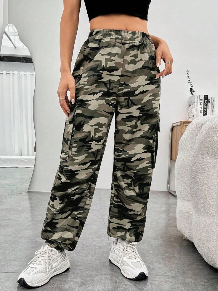 Make a bold fashion statement with our Camo Casual Printed Cargo Pants! Crafted from durable woven fabric and featuring a zipper fly, these unique pants are sure to turn heads. Perfect for outdoor adventures or everyday fun, you can finally let your personality shine. And blend into the background too as an added bonus. Details: Style: Casual Pattern Type: Camo Type: Cargo Pants Closure Type: Zipper Fly Waist Line: Natural Length: Long Fit Type: Regular Fit Fabric: Non-Stretch Material: Woven Bo Spring Cotton Combat Cargo Pants, Spring Combat Cotton Cargo Pants, Summer Combat Cotton Bottoms, Spring Combat Pants With Pockets, Spring Combat Cotton Pants, Summer Outdoor Cargo Pants, Spring Combat Cargo Pants, Combat Style Wide Leg Outdoor Bottoms, Outdoor Combat Wide Leg Bottoms