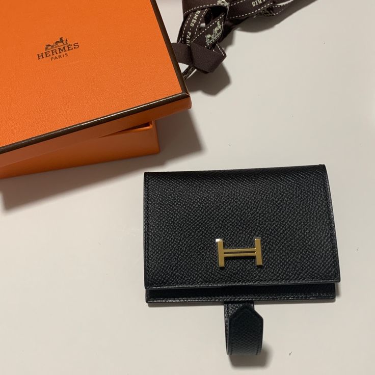 Brand New Wallet From Hermes. And Unused! New In Box. Hard To Get! Brand New With Box And Ribbons! 100% Authentic. Elegant Black Card Holder As Gift, Elegant Wallets With Box Included For Gift, Elegant Wallets With Box For Gift, Elegant Black Bifold Card Holder, Luxury Black Wallet For Gift, Card Holder With Original Box As Gift, Luxury Compact Card Holder For Business, Luxury Compact Business Card Holder, Luxury Compact Wallets As Gifts